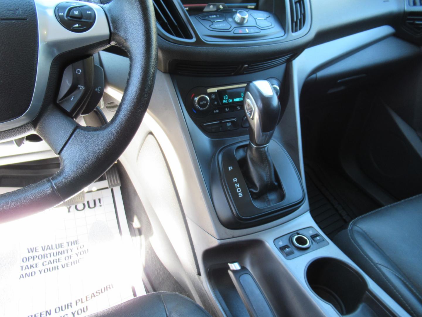 2014 Black /Black Ford Escape SE 4WD (1FMCU9GX5EU) with an 1.6L L4 DOHC 16V engine, Automatic transmission, located at 1511 North Shepherd Dr., Houston, TX, 77008, (281) 657-1221, 29.798361, -95.412560 - 2014 FORD ESCAPE SE VIN: 1FMCU9GX5EUC37295 1 F M C U 9 G X 5 E U C 3 7 2 9 5 4 DOOR WAGON/SPORT UTILITY 1.6L I4 F DOHC 16V GASOLINE FRONT WHEEL DRIVE W/ 4X4 - Photo#8